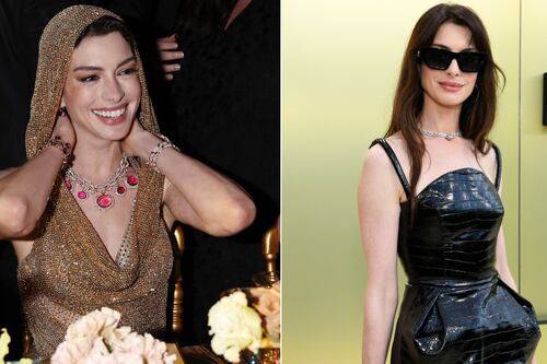 “É Falso!” Anne Hathaway brilha com elegante vestido vermelho, mas um ‘gesto’ ofuscou seu visual